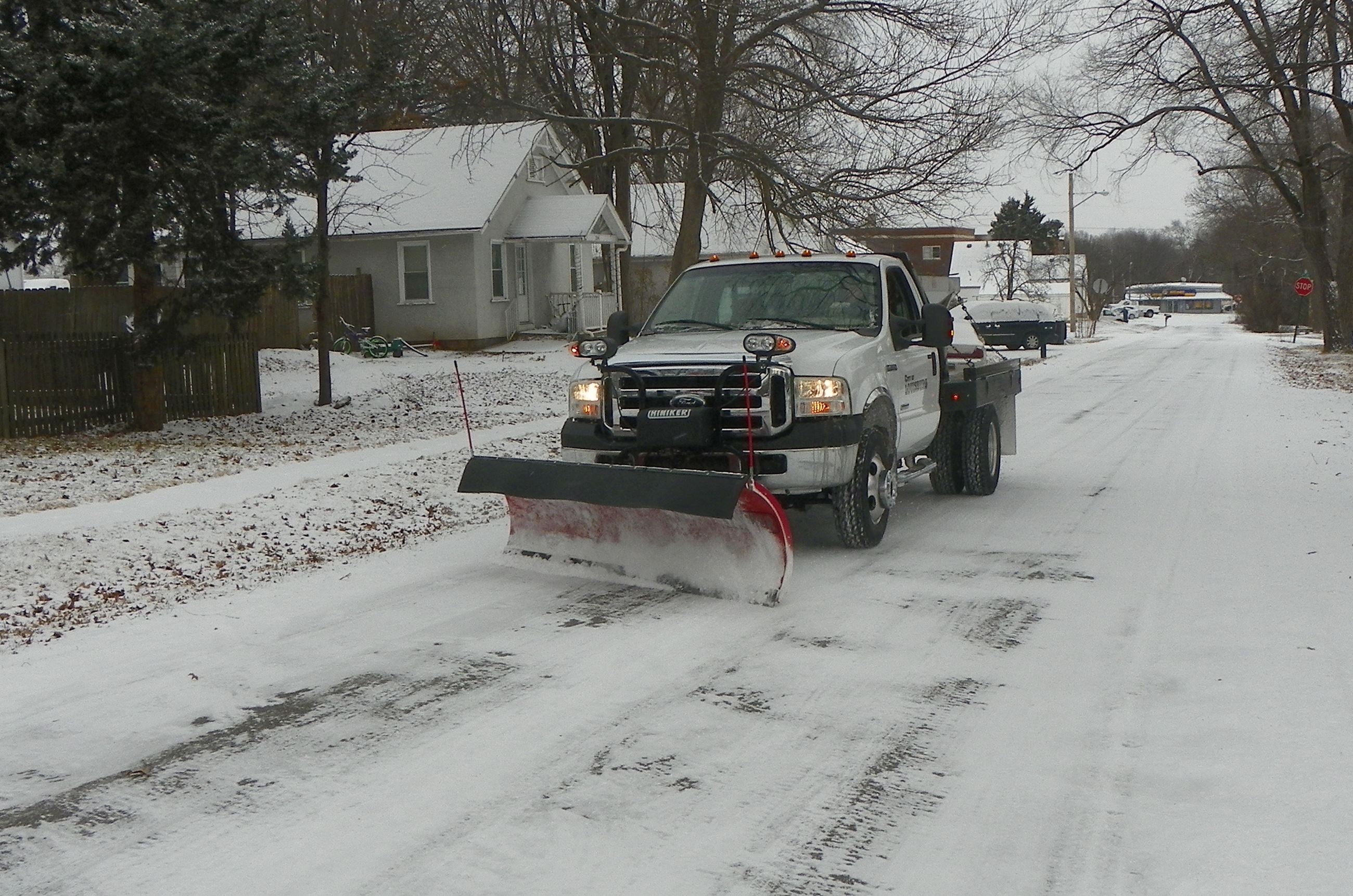 Louisburg city crews remove snow on city streets.